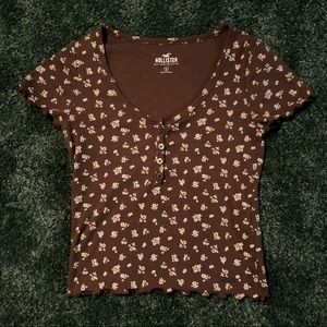 brown floral top with buttons that open